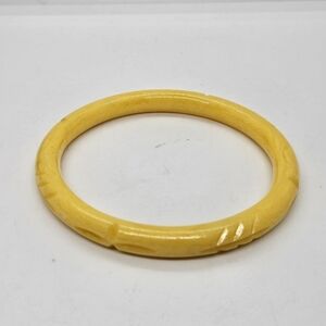 yellow carved acrylic bangle